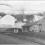 Homes built in the early 50s where the mound once stood. What remained of the mound can be seen behind these houses; it was completely gone not long after this.
