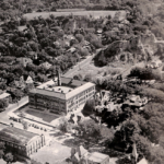 1948 arial view of High School and Gymnasium (Note Gibraltar Mound in upper right). It’s already receding quite a bit due to “fill dirt” removal. And note Kirn Field (now a PARK) off in the distance!